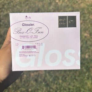 Swatched cranberry trio glossier